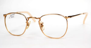 Kleine Golddoublé Brille aus den 50er Jahren, in schmaler Kareeform