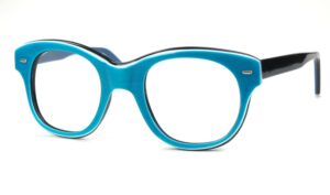 Große, echte Vintagebrille der 80er Jahre im kräftigen Türkis mit schwarzen Bügeln