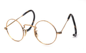 Runde Brille aus Golddoublé mit Sportbügeln und Seitenstegen aus den 30er Jahren