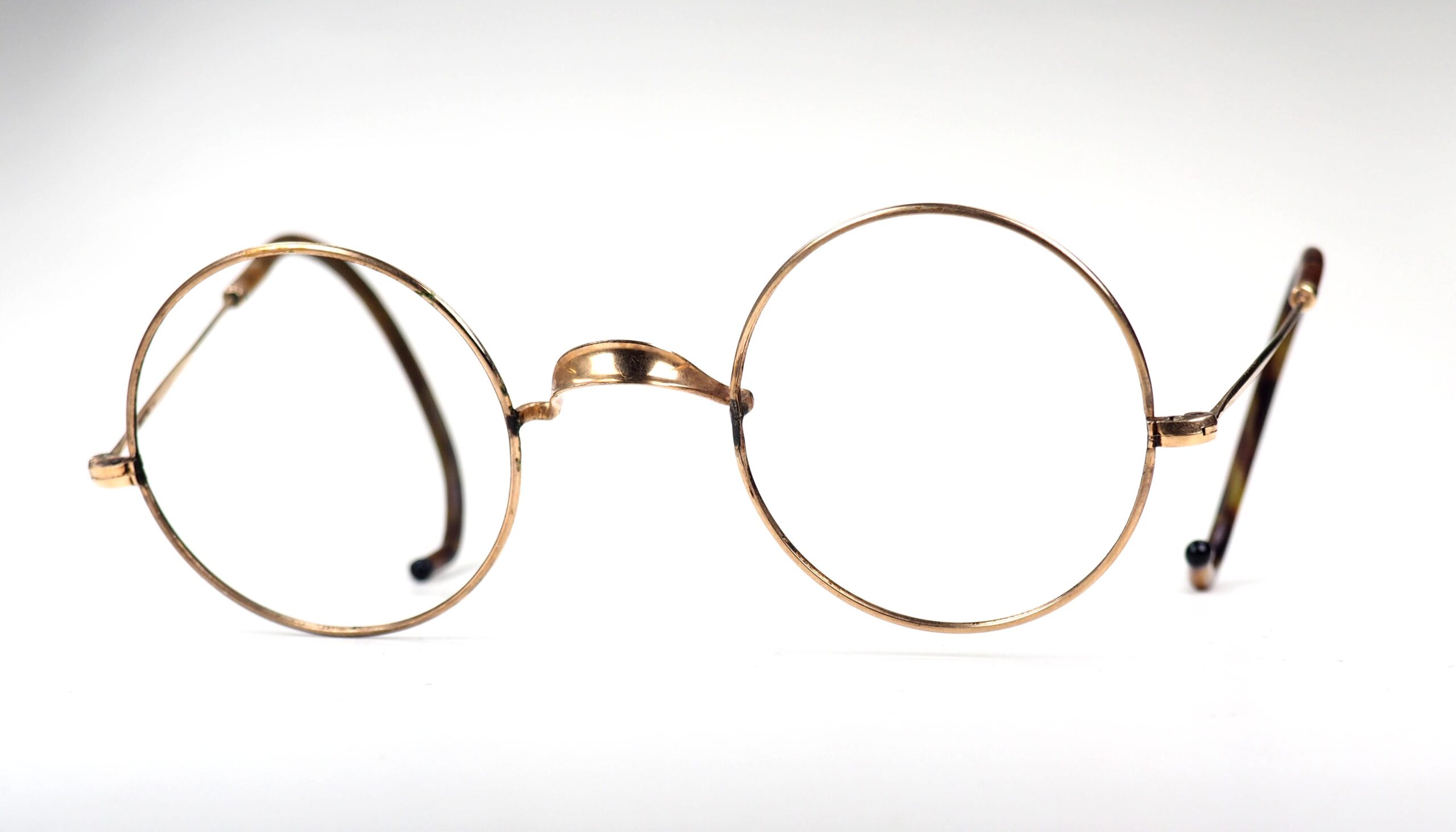 Runde Brille aus Golddoublé mit Sportbügeln, aus den 30er Jahren