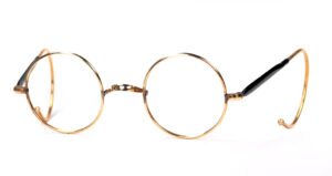 Runde, kleine Antikbrille aus den 30er Jahren mit W-Steg in Golddoublé