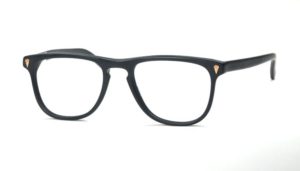 Schwarzmatte Vintagebrille der 80er Jahre mit Schmucknieten