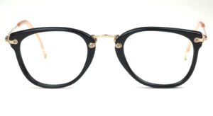 90er Jahre Vintagebrille, schwarz mit goldenem Mittelsteg, 14 Karat